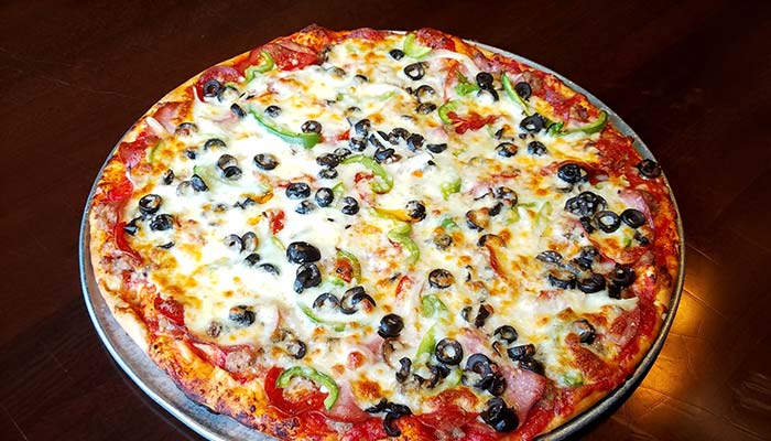 Frankie's Chicago Style Pizza restaurant in Maple Grove, MN serves the monster thin crust pizza